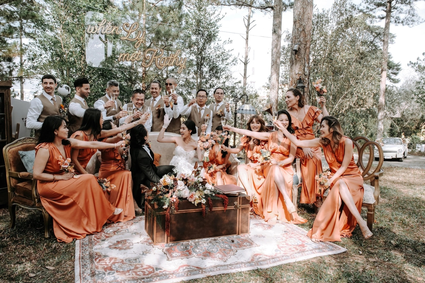 Wedding party gathered together at an outdoor celebration